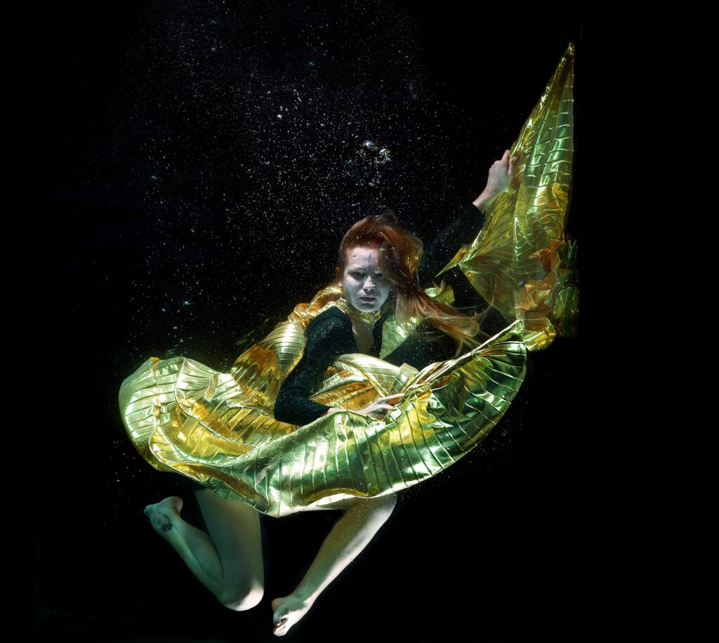 Underwater Photo of Woman Wearing Green and Black Dress by Engin Akyurt