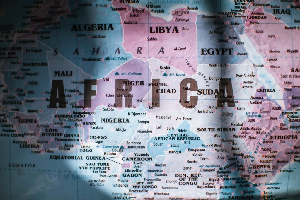 Closeup of map of Africa with countries borders and water on sunny day by Nothing Ahead
