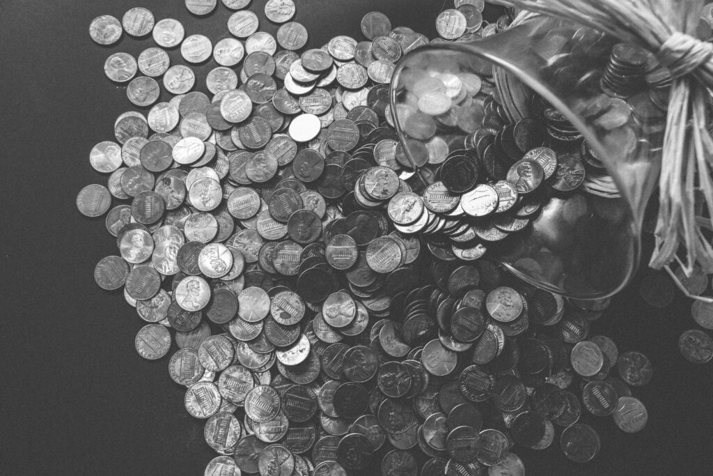 Grayscale Photo of Coins by Pixabay