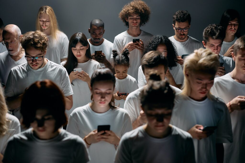 Photo of People Engaged on their Phones by cottonbro studio
