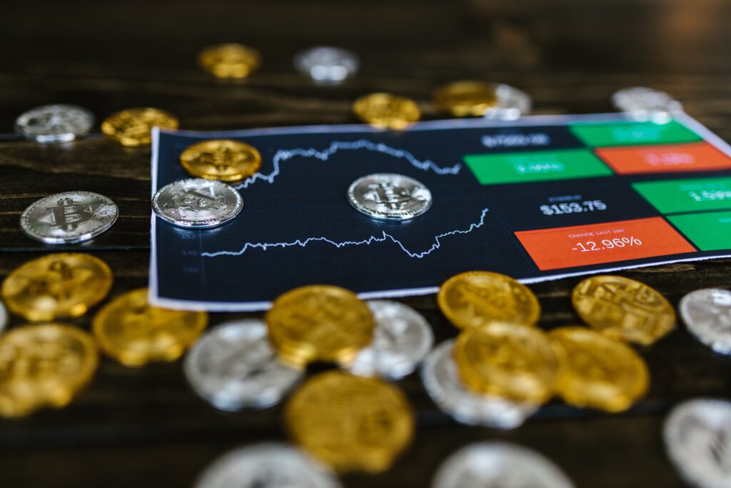 Selective Focus Photo of Silver and Gold Bitcoins by RDNE Stock project