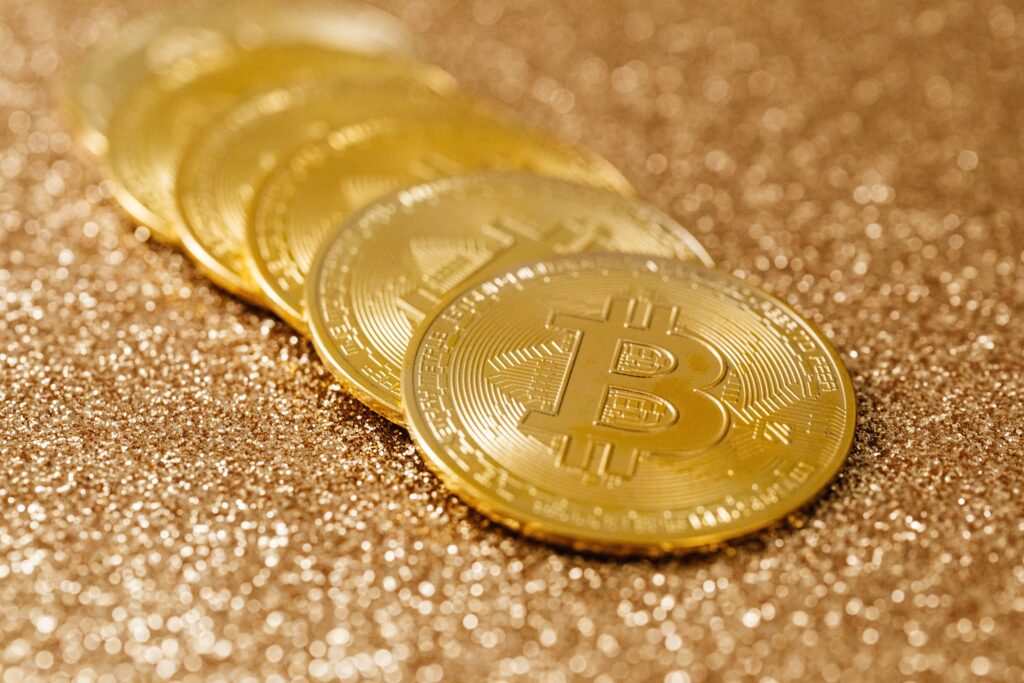 Gold Bitcoin Coins  by Karolina Grabowska