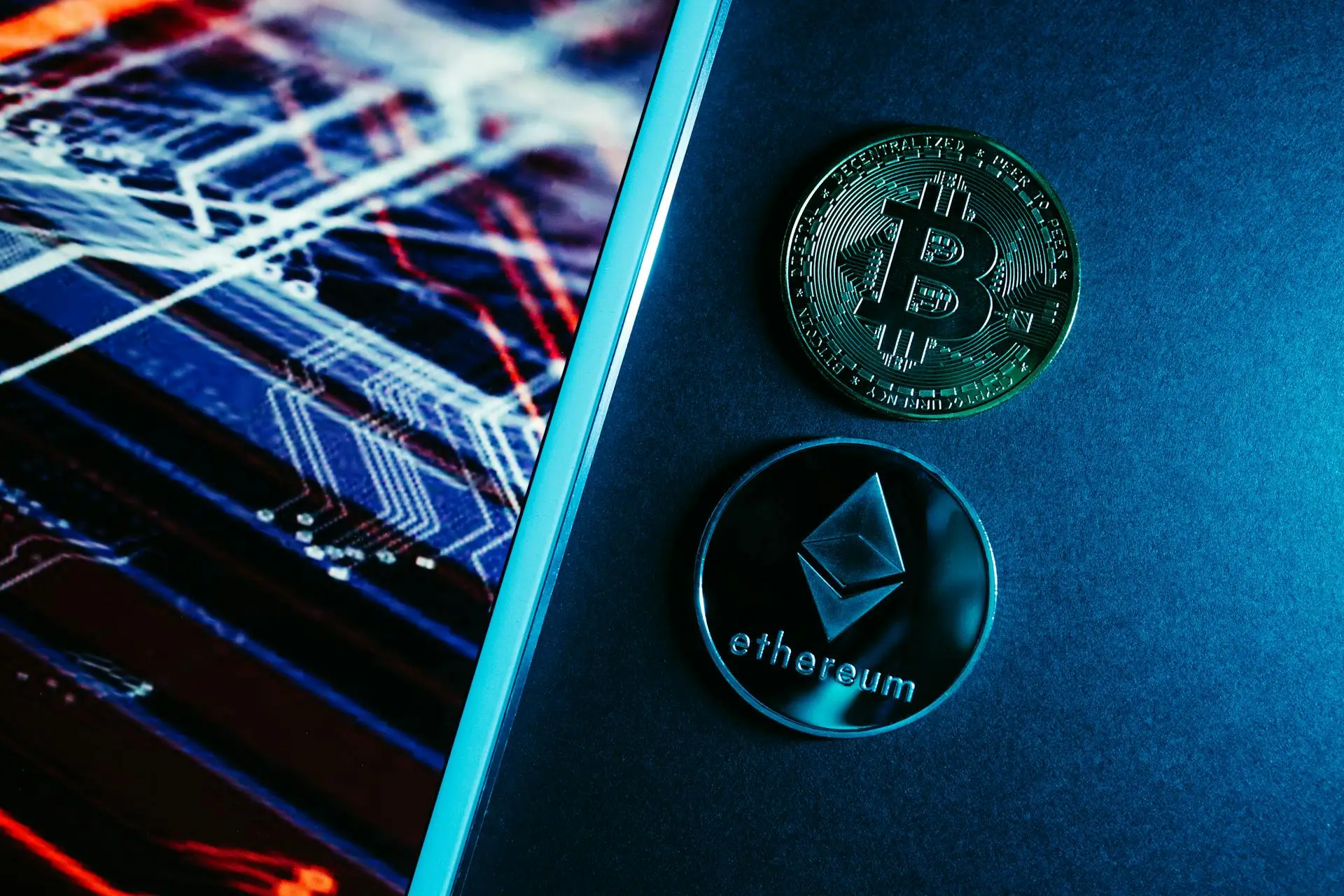 Bitcoin and Ethereum coins beside market screen image