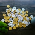 Cryptocurrency coins on wooden table image
